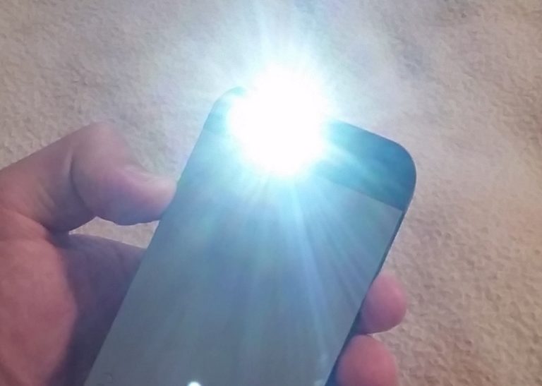 Why Is My iPhone Flashlight Turning Itself On & How to Quickly Turn it Off